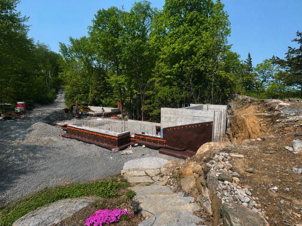 Foundation waterproofing and drainage board before backfill