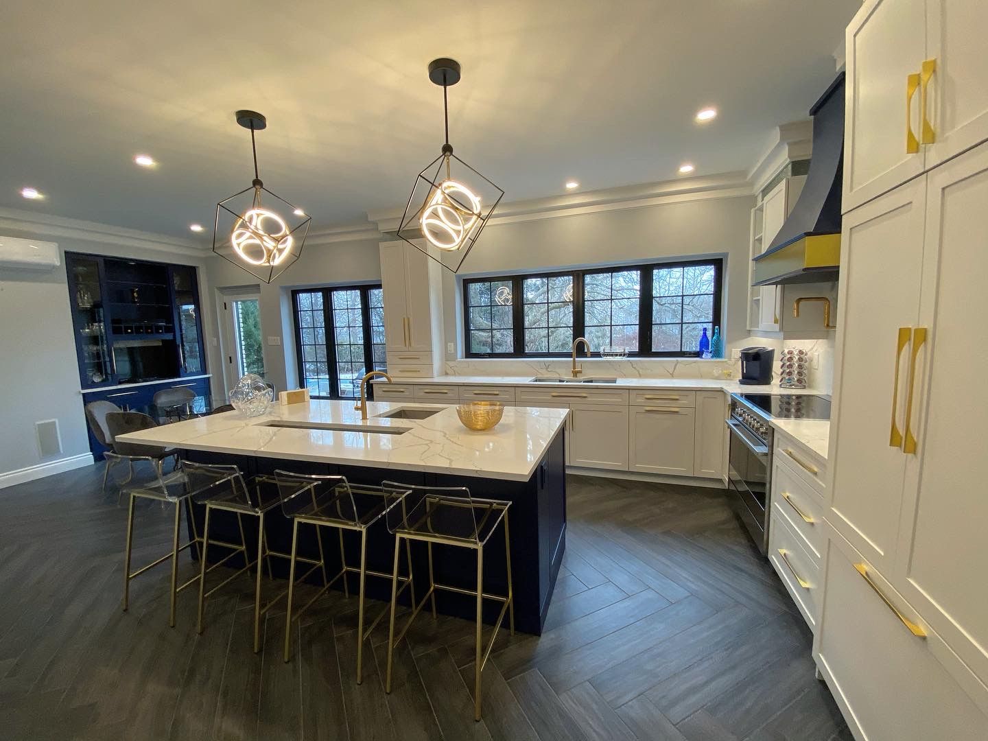 Renovated chef's kitchen in marble and navy